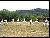 powiększ