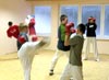 powiększ