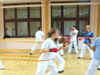 powiększ