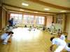 powiększ