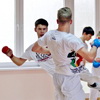 powiększ
